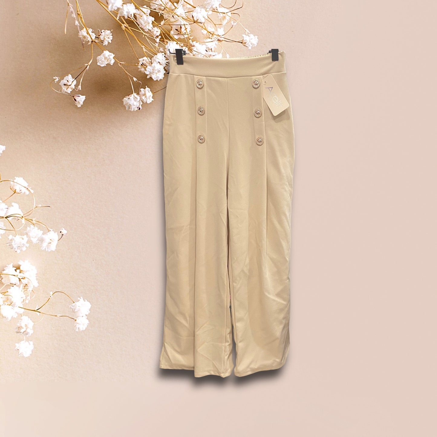 Pantalón botones dorados